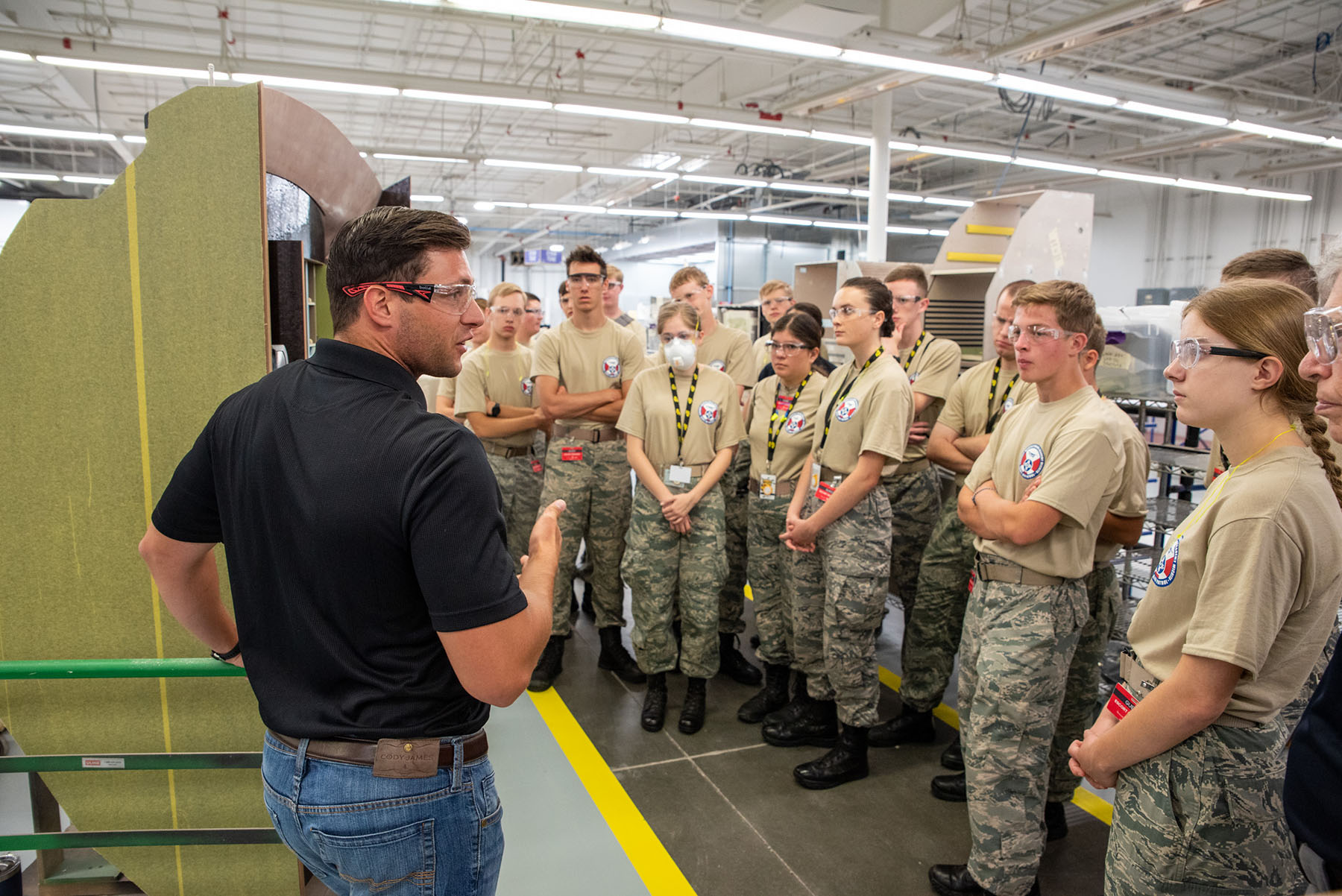 Members of the military getting a Textron Aviation factory tour.